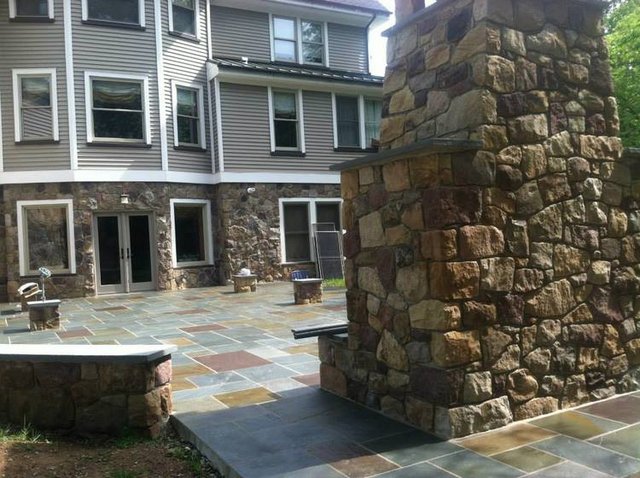 Entertainment Patio - Completed Stone Fireplace and Stone Side-seating