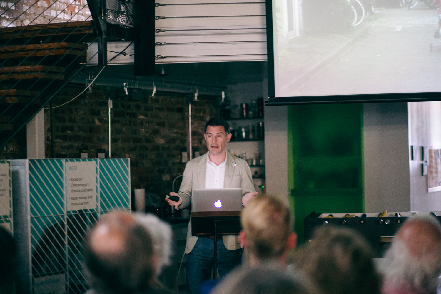 Kicking off the workshop, Mike Lydon presented Tactical Urbanism methods and examples, giving the audience a sample of what might come out of the following day’s workshopping. (Credit: Our Ampersand Photography )