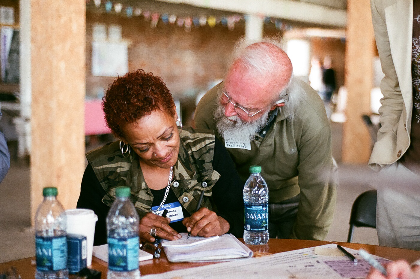 Glass Street business owner Toni Gaines and Chattanooga urban guru Stroud Watson worked together in considering the needs of the community and exploring ways proposals might respond. (Credit: Ashton Lance )