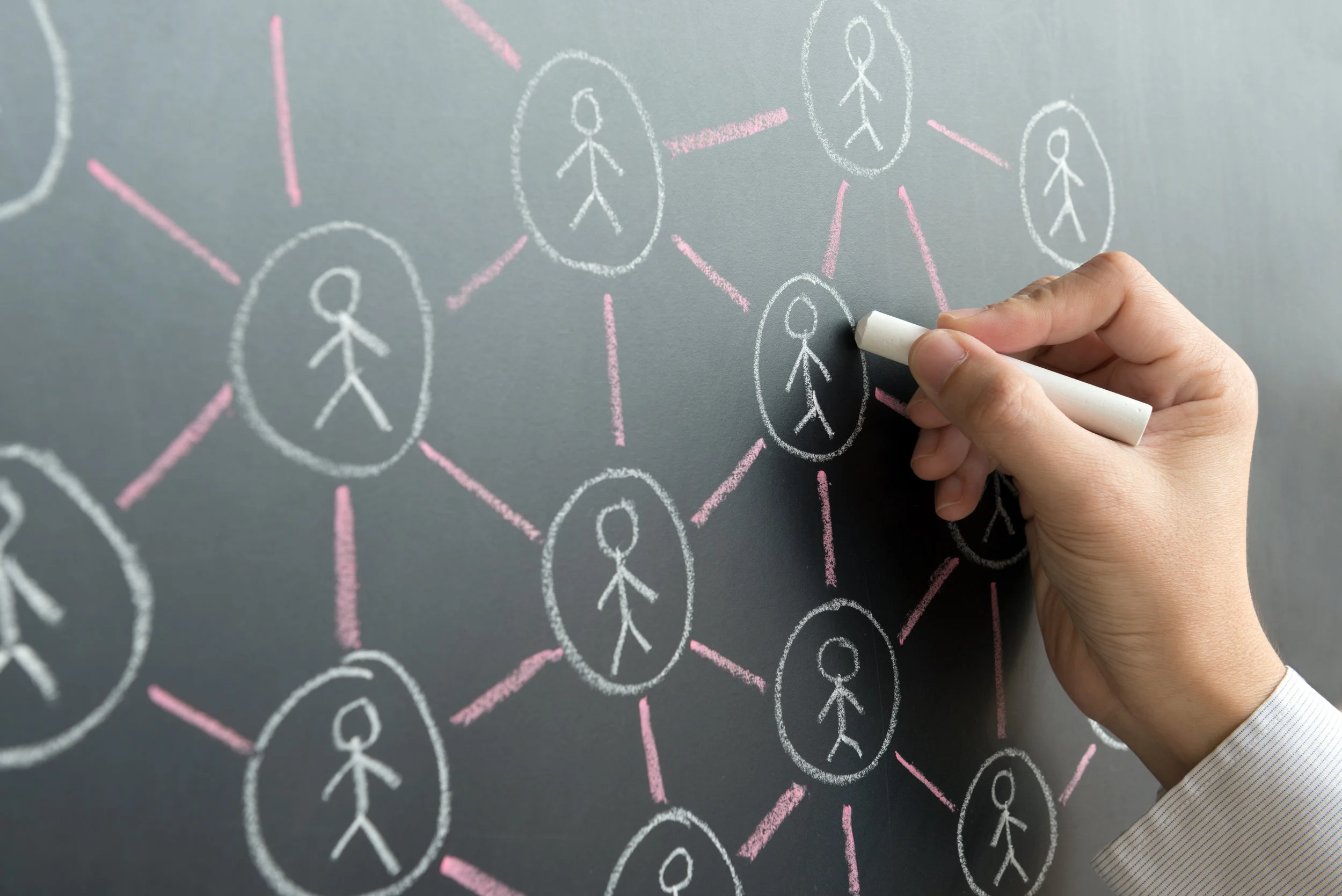 connecting community chalkboard people stock.jpeg