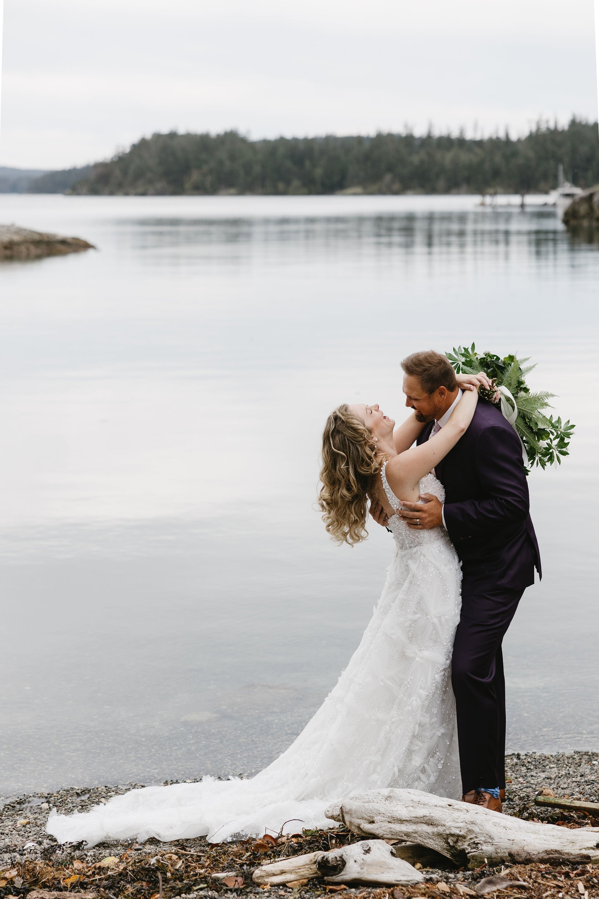 Bride and groom first look by the water