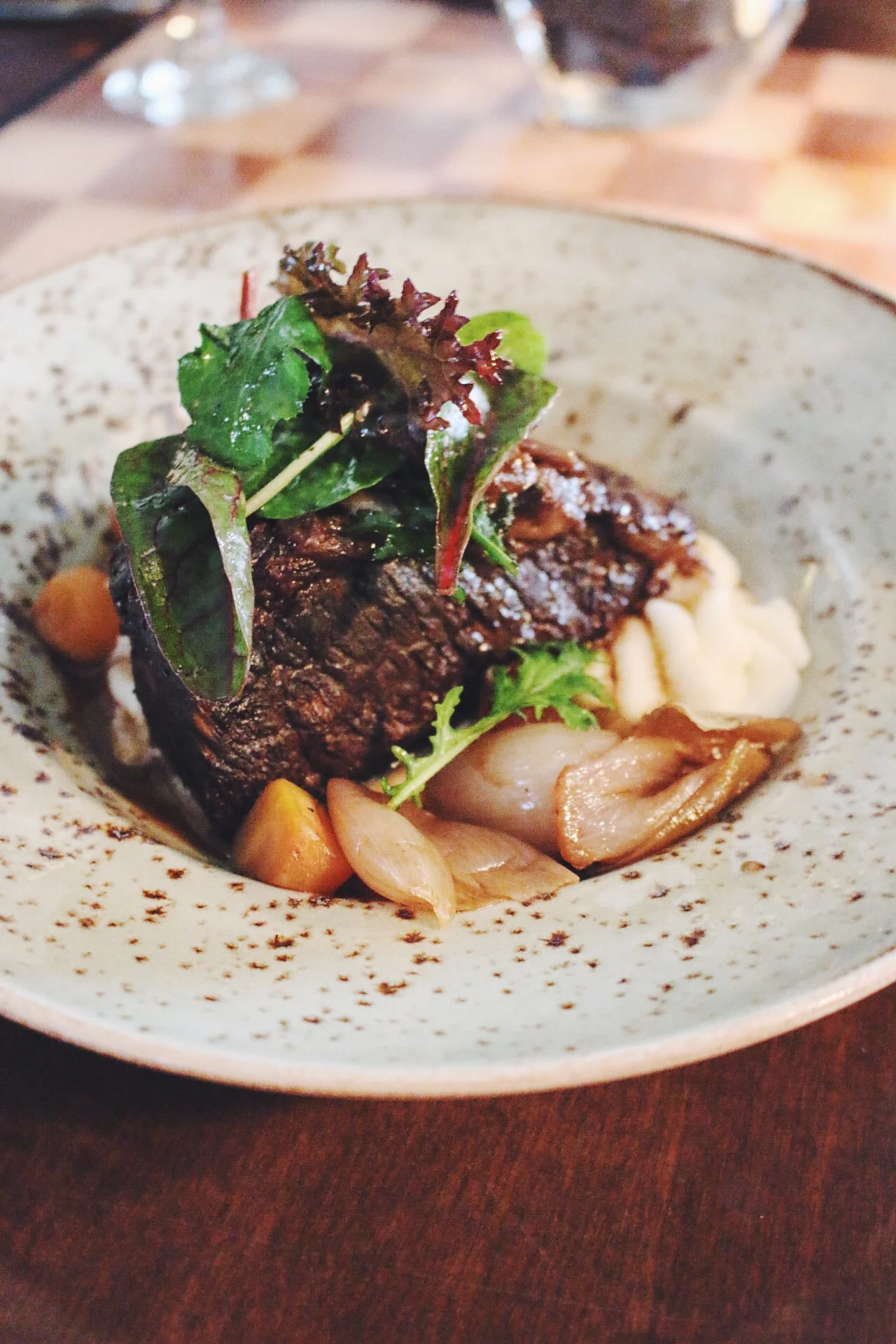 Red wine braised short rib with root vegetables