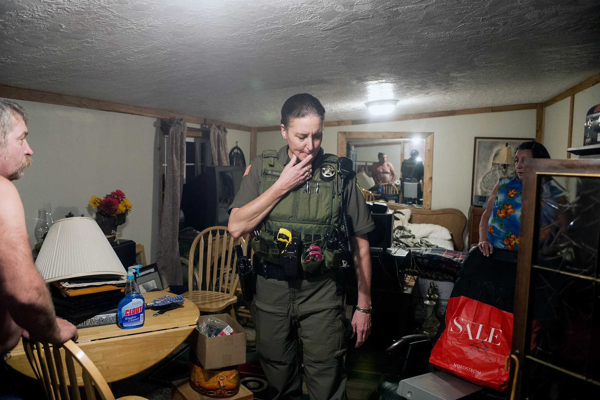  Lewis County Sheriff's Deputy Sue Shannon speaks with Frank and Bonnie Vanderhule at their home in Randle, Wash. Shannon made a stop at the Vanderhule residence to speak with Frank Vanderhule, left and his wife, Bonnie, right, and attempt to locate 
