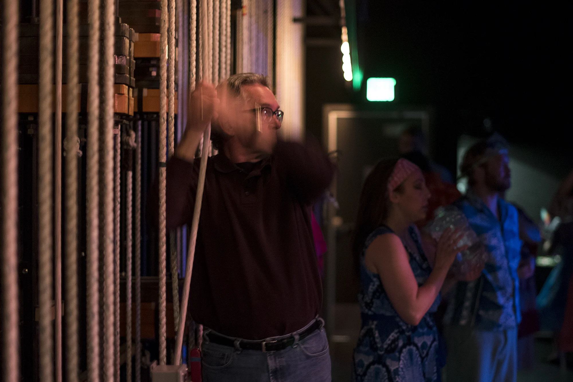  Tyrrell quickly pulls the scrim, a temporary background used throughout the play, during a performance of "Once on This Island" at the Corbet Theatre on Thursday, May 19. &nbsp;"That sucker is heavy," said the 64 year old of the 150-pound weight he 