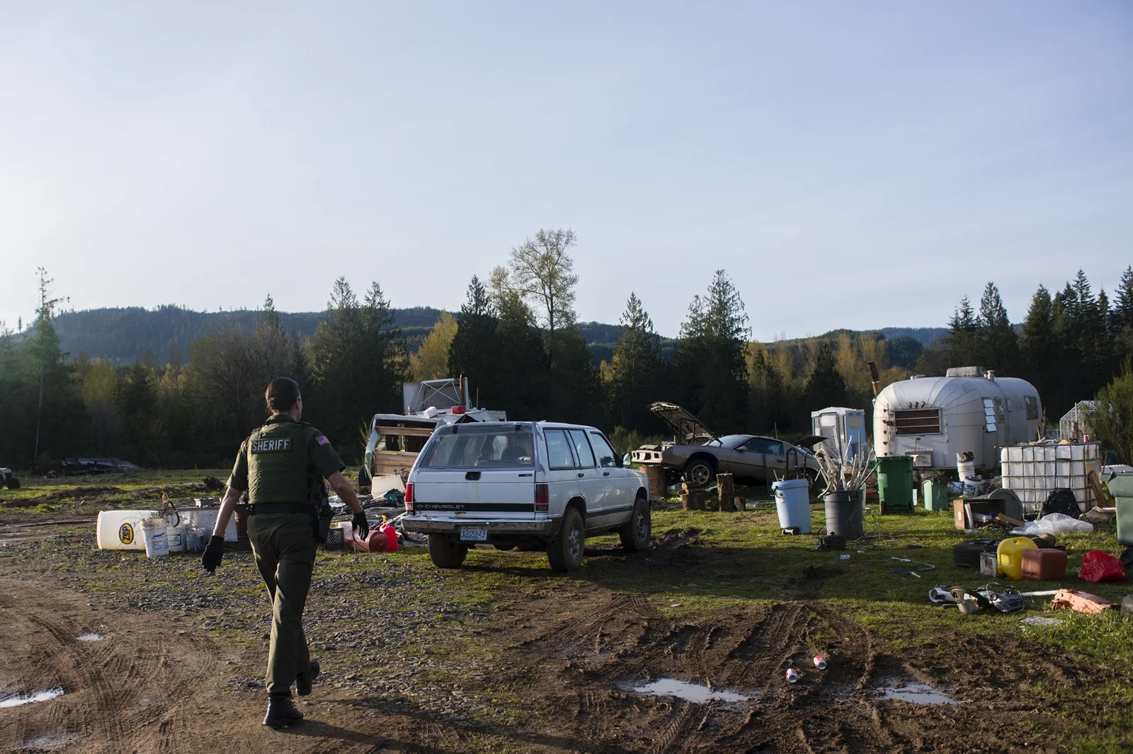  It's a daily situation for Lewis County Sheriff's Deputy Sue Shannon: alone, making house calls, in a rural, grimy part of East Lewis County.&nbsp;  In search of a Mineral man, who had evaded arrest for a number of weeks, and woman who was wanted on