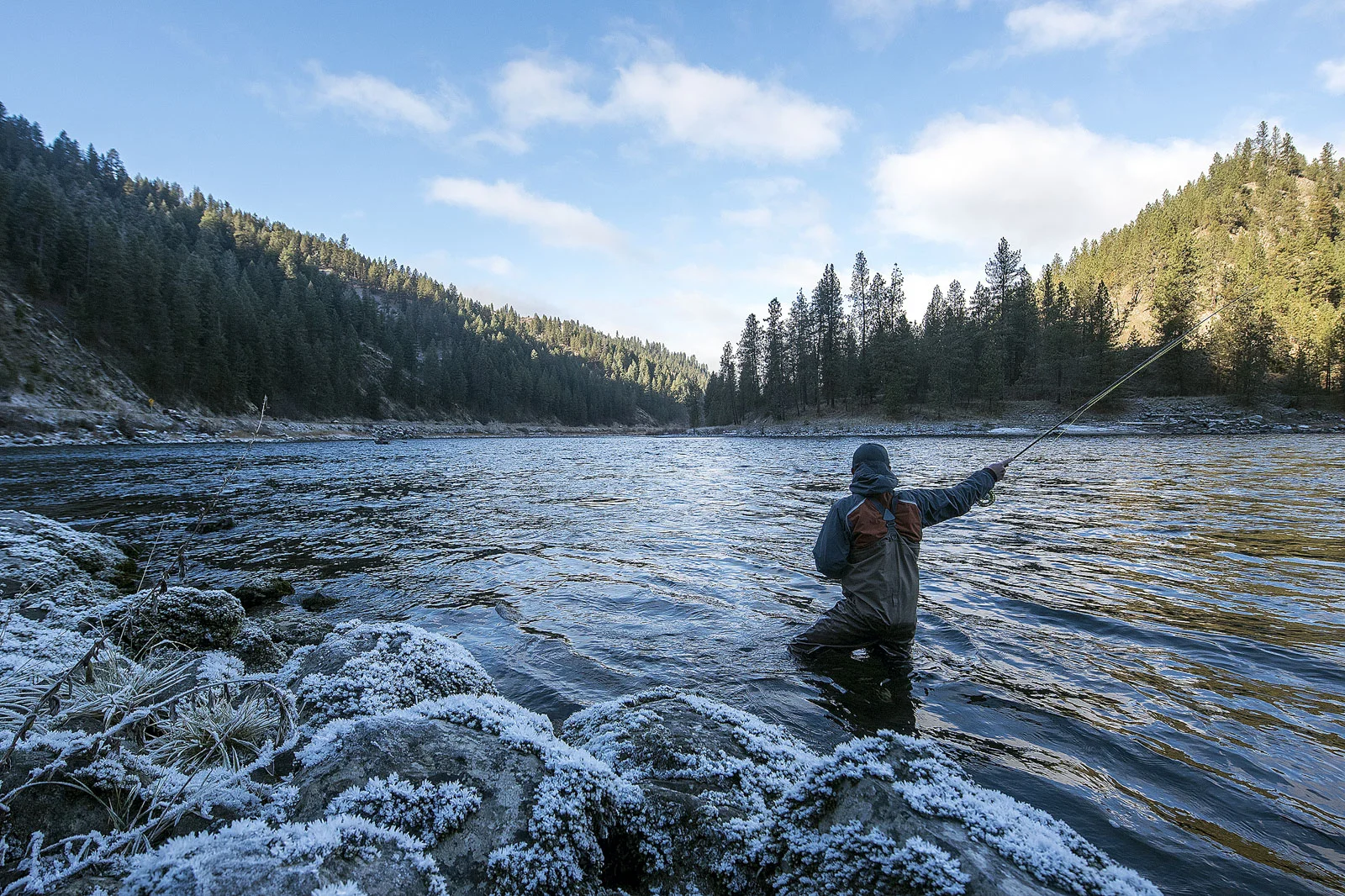 Remington Salonen, of Julietta, Idaho, fly fishes along the frosty banks of the Clearwater River near Harpers Bend on Friday, Dec. 8, 2017. Salonen said he was using swinging intruders on sink tips as his bait.