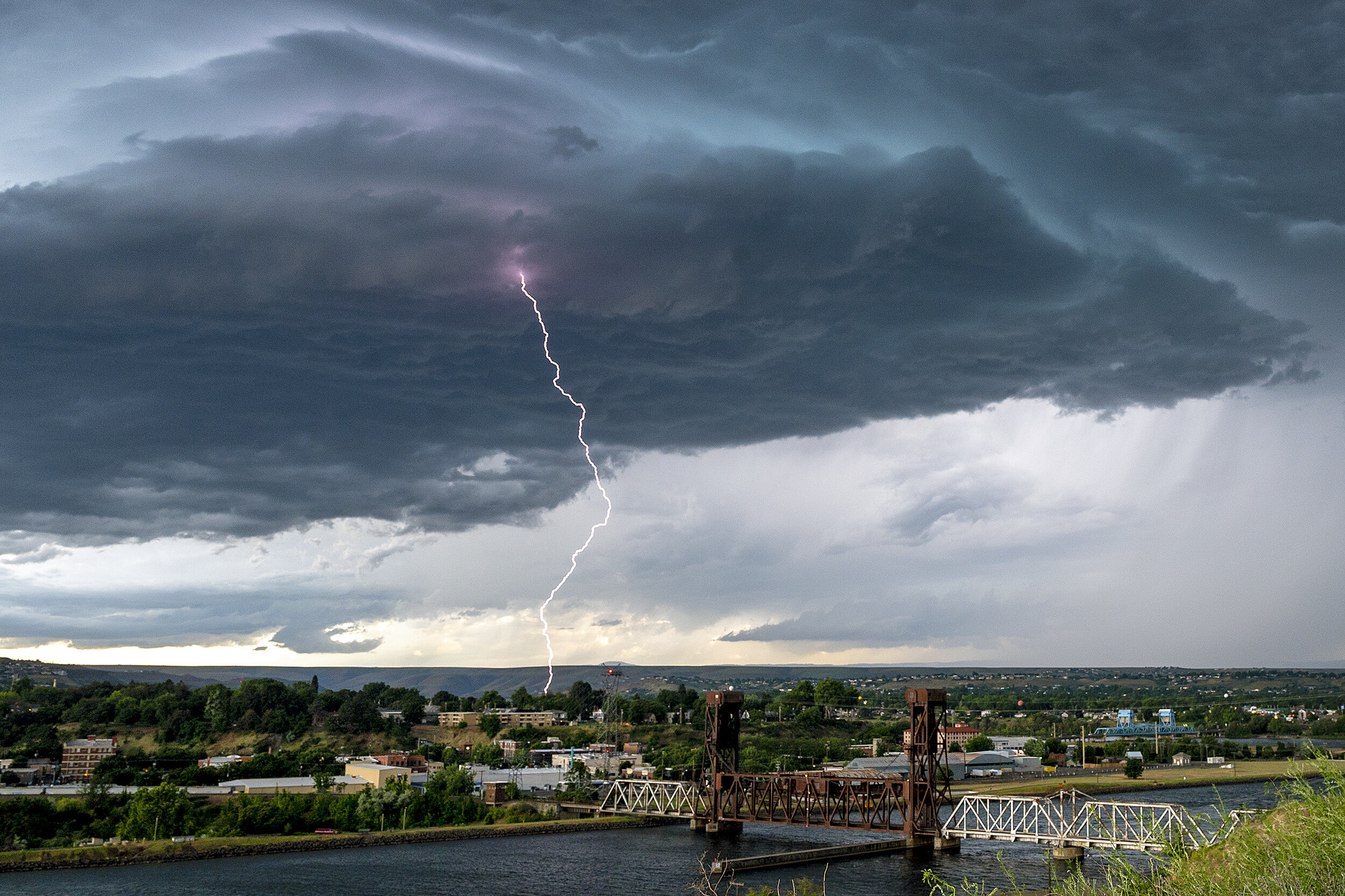 A bolt of lightning strikes down in Lewiston, Idaho as a storm passes through the Lewiston-Clarkston Valley on Friday, June 12, 2020. 