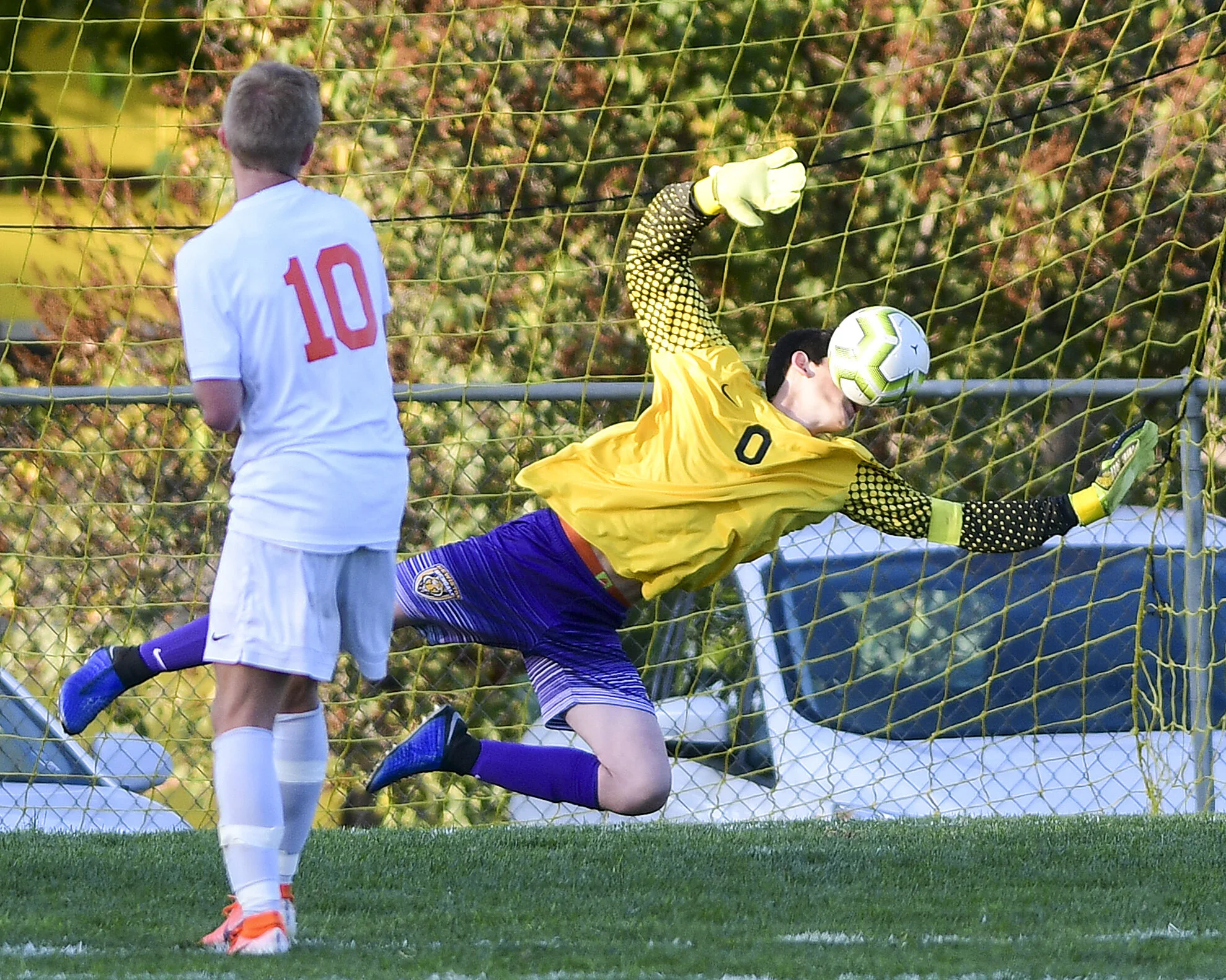 Lewiston goalkeeper Nikko Vega uses his face to make a save on a shot from Post Falls' Mckie Gregory during the second half of a 5A Inland Empire League soccer game on Tuesday, Oct. 1, 2019, in Lewiston, Idaho. 