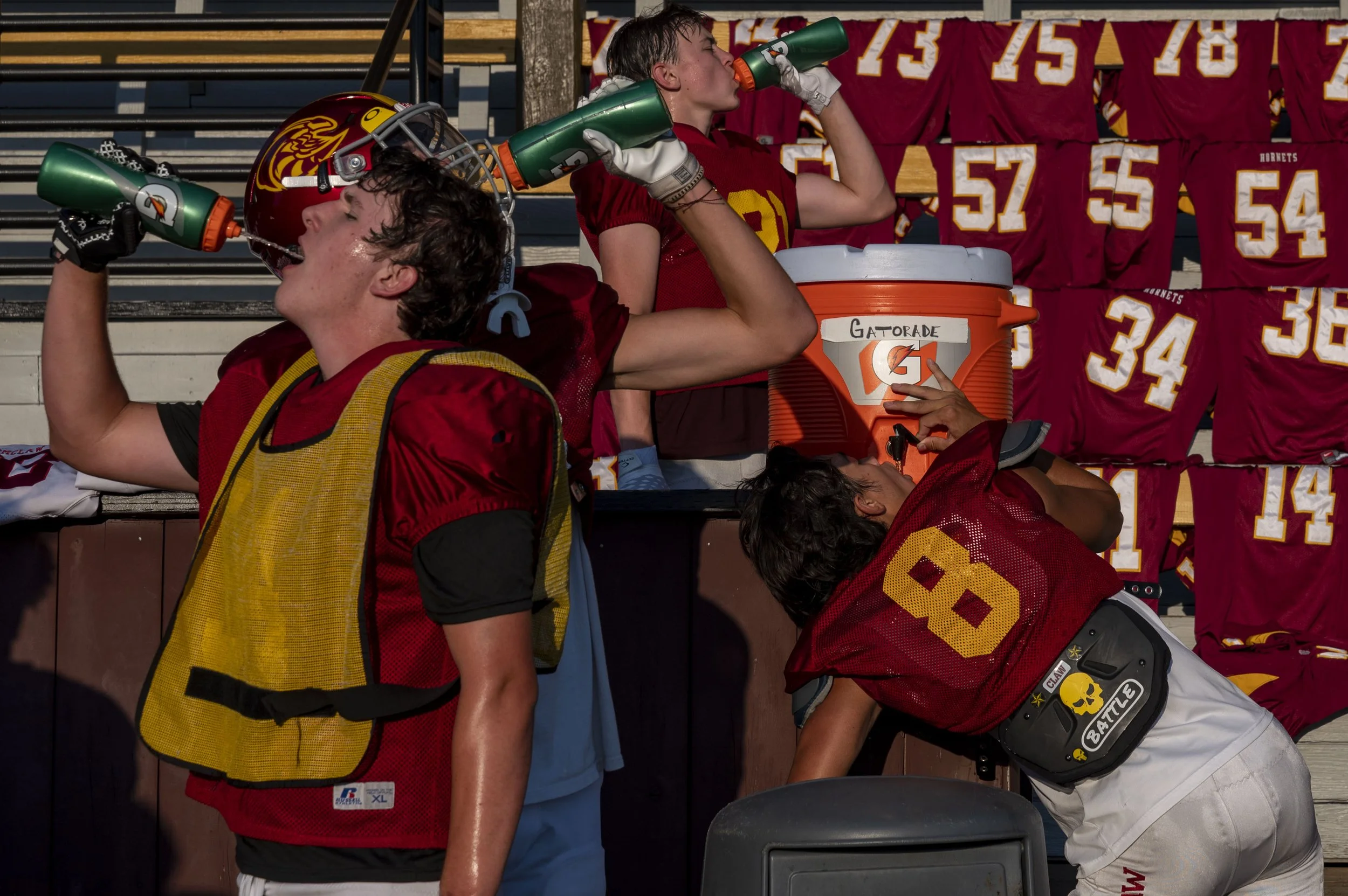  Enumclaw players take a water break in between drills at practice on Wednesday, Aug. 24, 2022, in Enumclaw, Wash. 