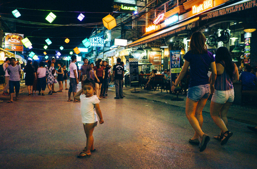 Past her bed time. Pub Street Siem Reap, Cambodia.