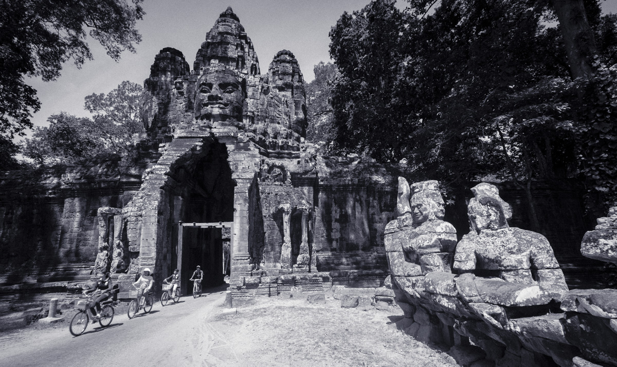 This stone gate house is one of the entrances to Angkor Thom, The Great City, the capitol city of the Khmer Empire, and was built over 800 years ago. Angkor Cambodia.