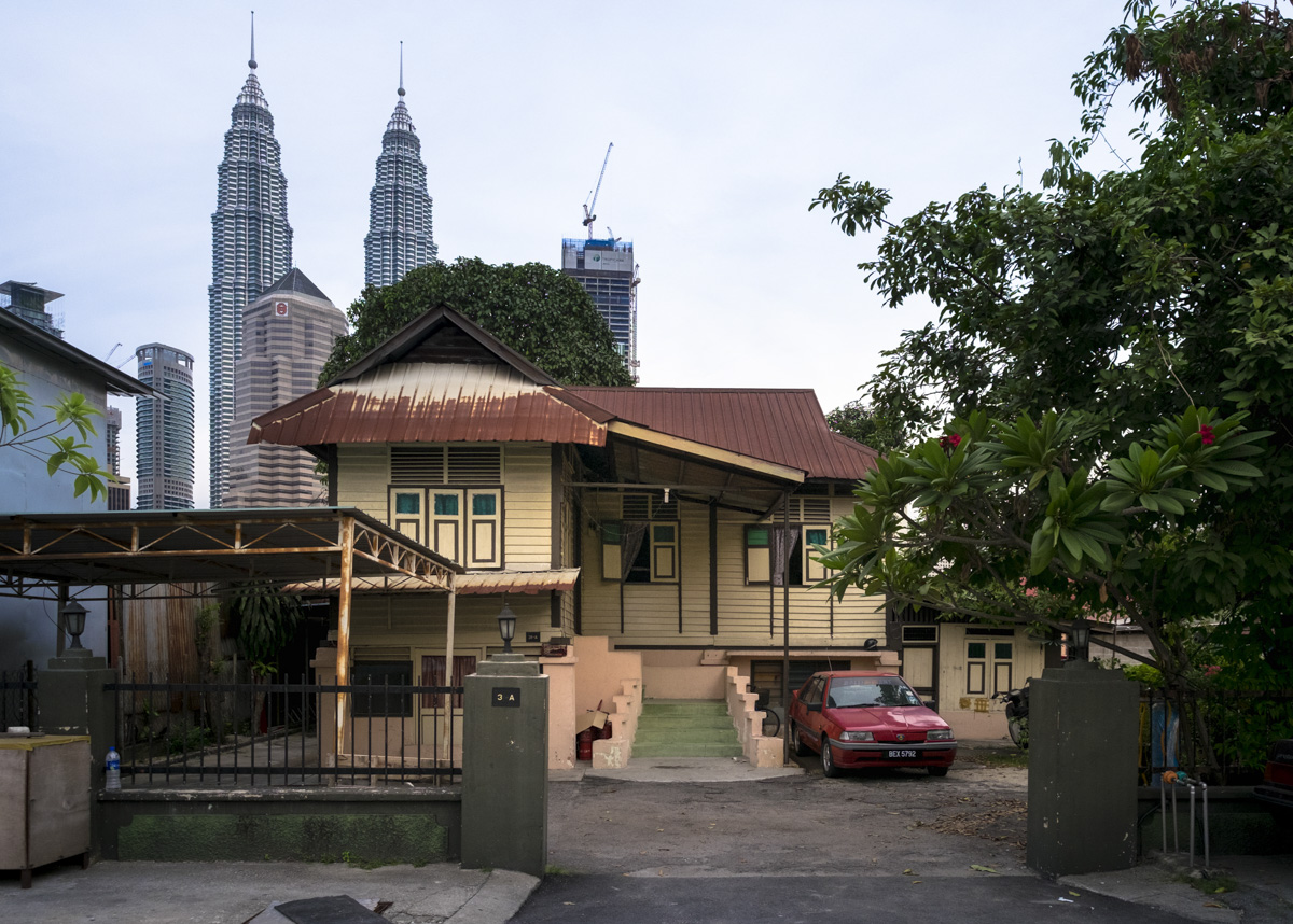 As the city encroachs the traditional village of Kampung Baru, Kuala Lumpur.