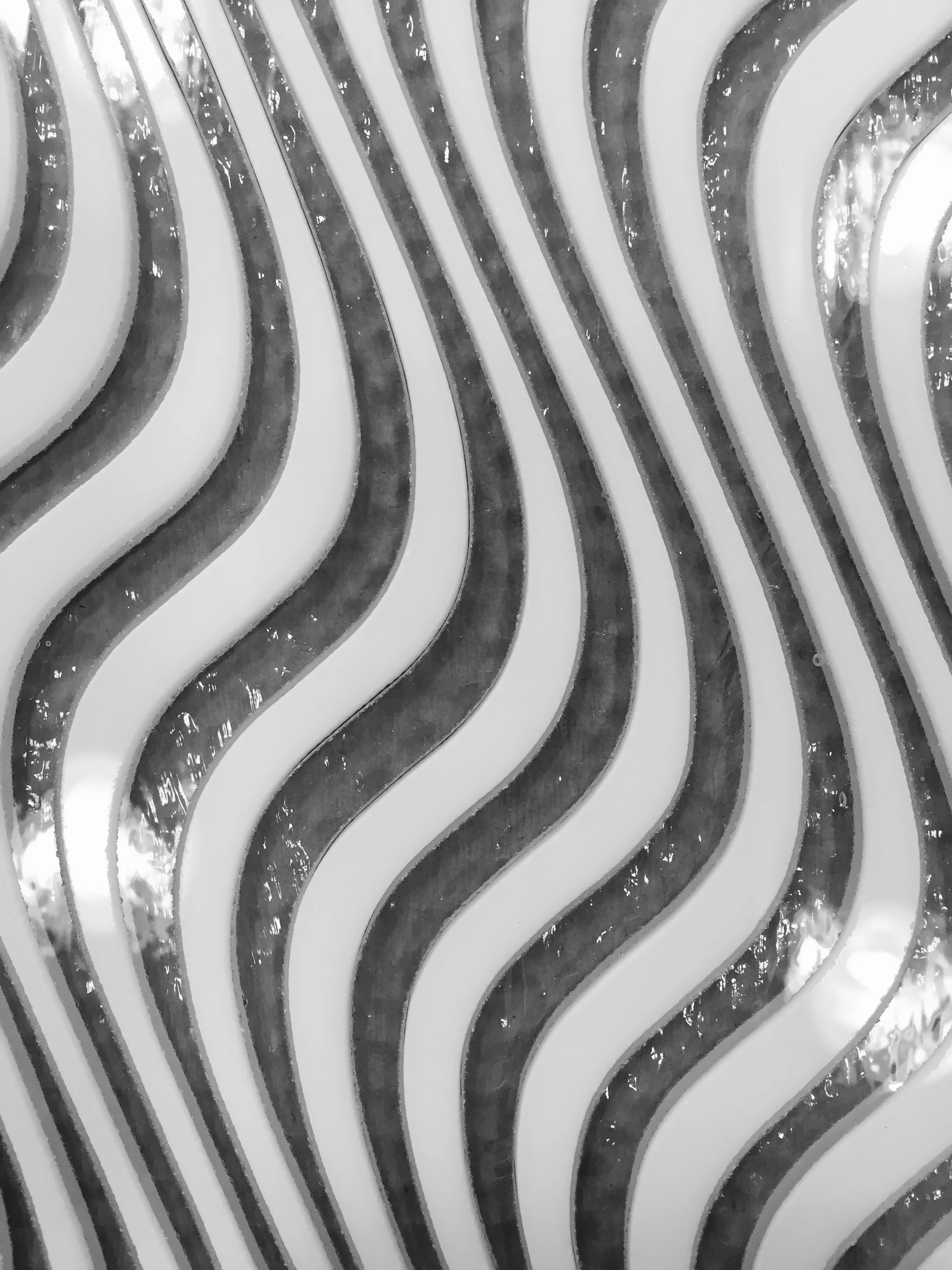 Detail of full fused opaque white and clear glass.