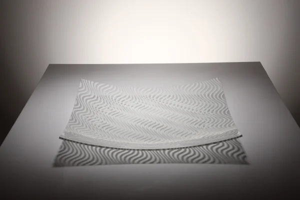 Once complete this design creates a light optical effect and a simple sensation of movement. The Final design that plays with the eye and also is effected by light that being made from opaque and clear glass creates shadows adding another dimension creating a simple minimal functional work of art.