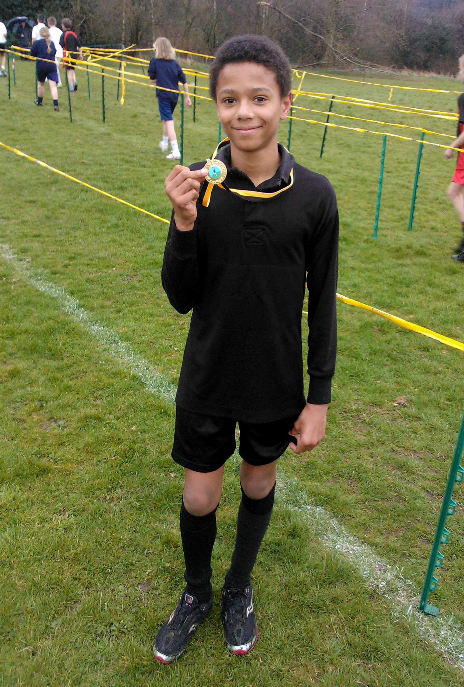 Adam Saul-Braddock with his Gold Medal