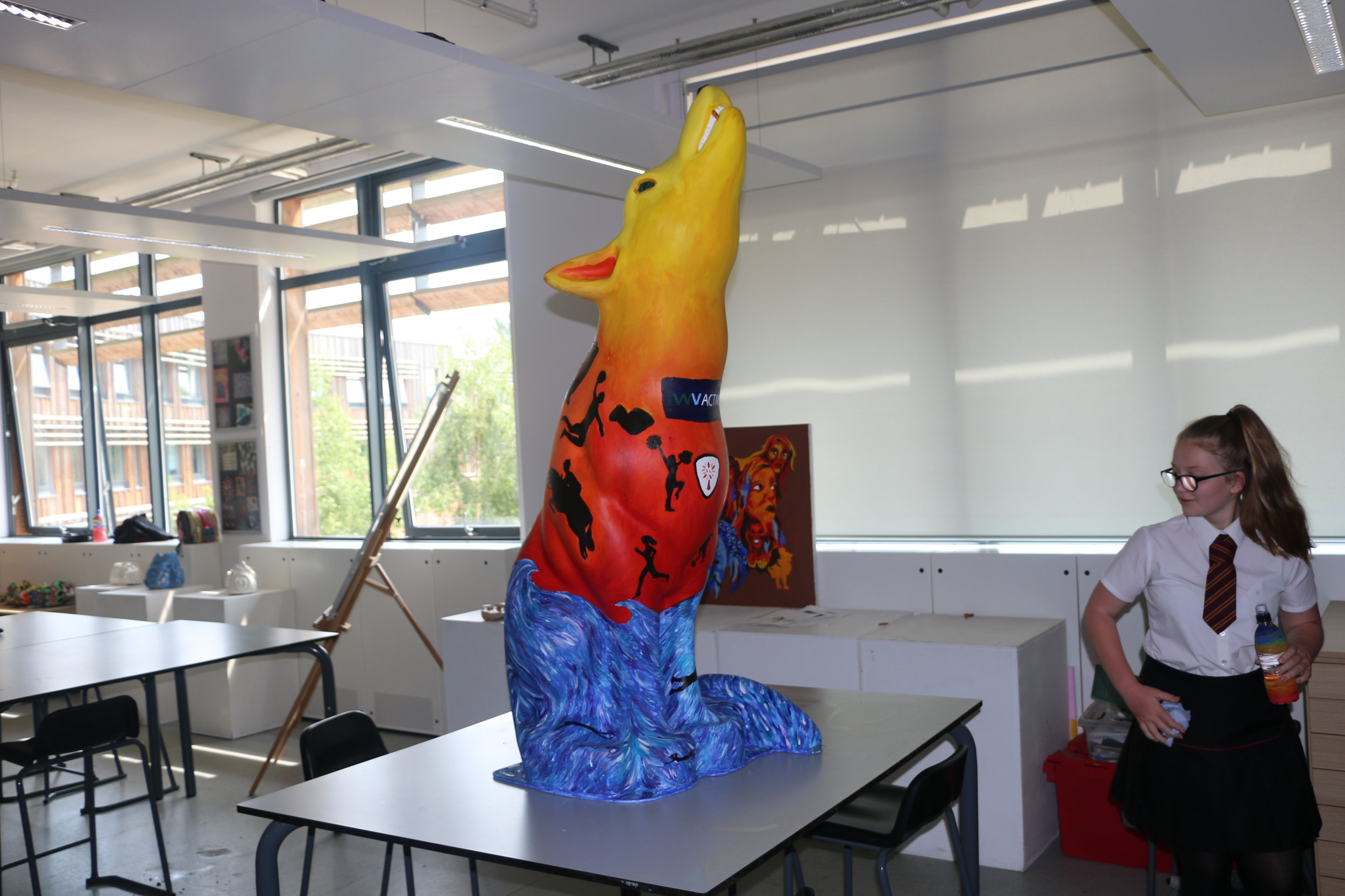 Colourful wolf sculpture completed for city trail