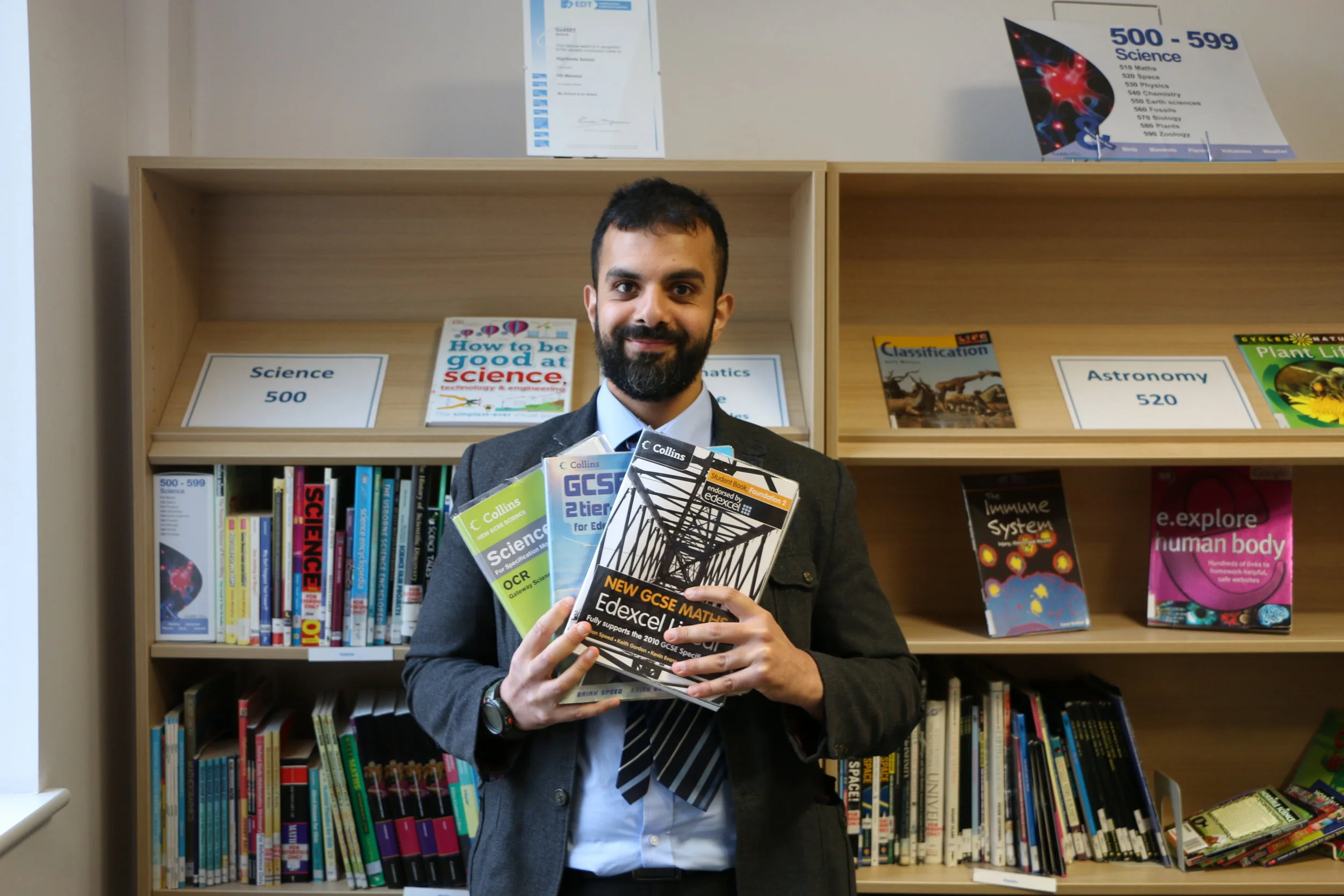 Textbooks donated to orphaned African youngsters