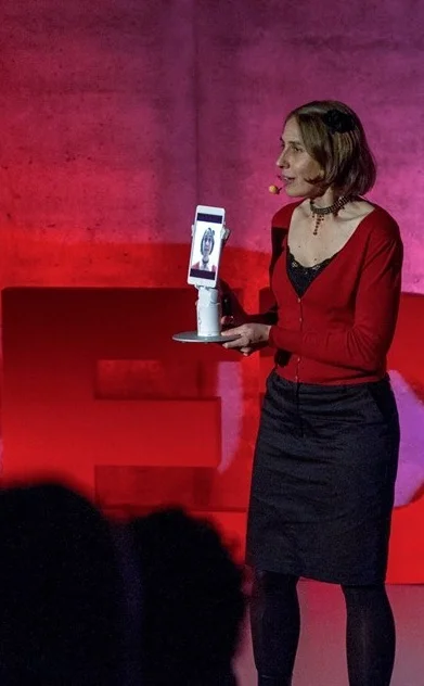 Lisette on stage at TEDx
