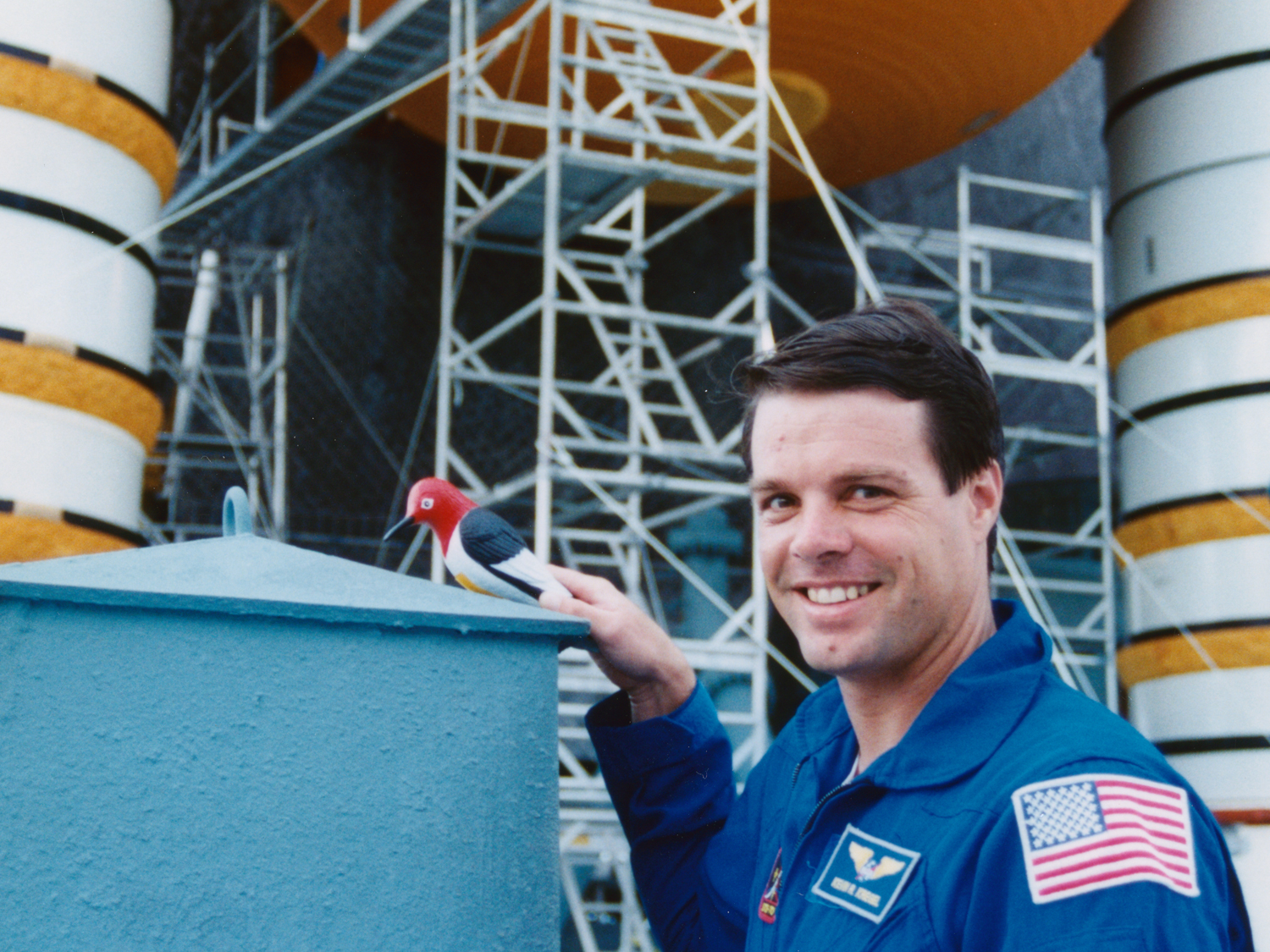  Pilot Kevin Kregel poses while repairs are made (photo Don Thomas). 