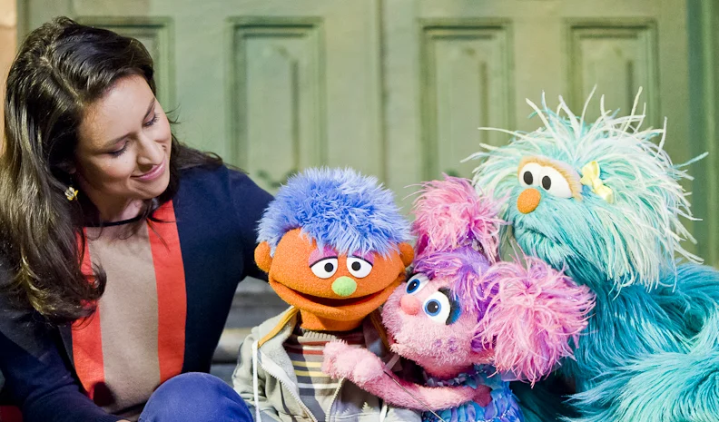 Sofia, Abby and Rosita comfort Alex by giving him a hug and listening to his feelings as part of Sesame Street’s Little Children, Big Challenges: Incarceration initiative. © 2013 Sesame Workshop. Photo by: Gil Vaknin
