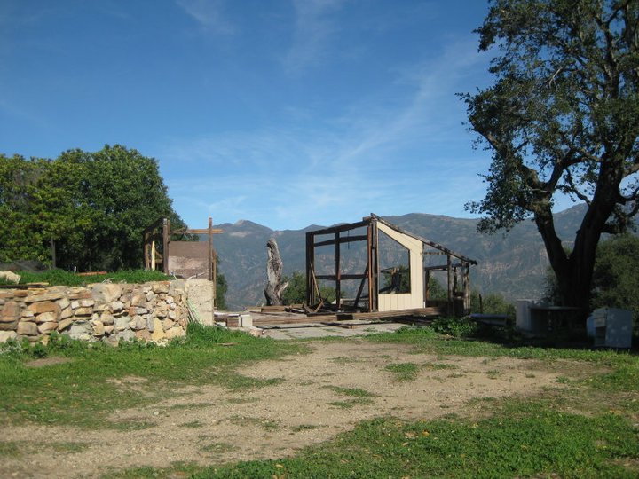 PARTS OF THE FRAME of the "temporary" Workshop are shown as the construction crew demolishes the building. (Leslie Bridger photo, January 2011.)
