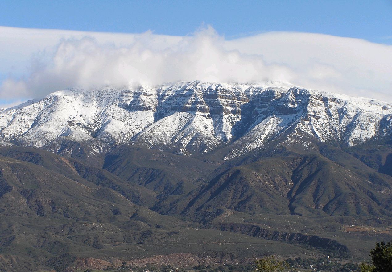 THE 6,200-FOOT TOPA TOPA BLUFFS as seen from Meher Mount after a winter storm. (Brad Spurr photo.)