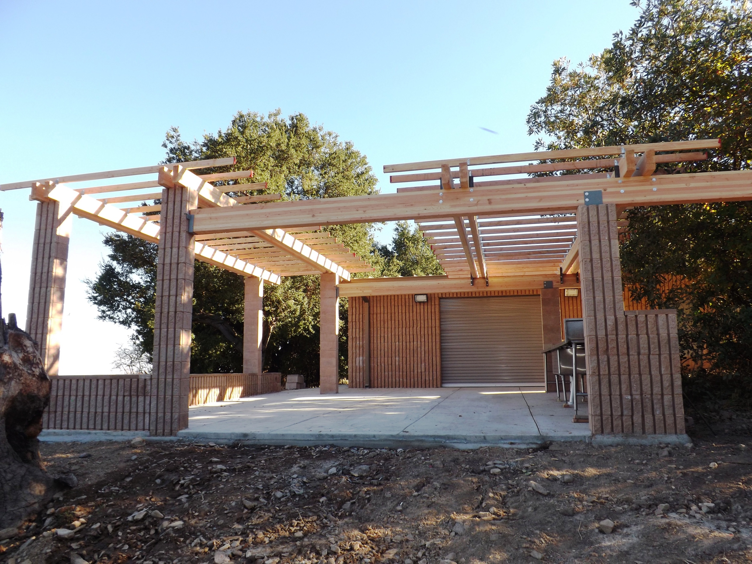 THE TOPA TOPA PATIO extends from the Workshop creating a visualy cohesive and practical set of structures that enhance the visitor's experience at Meher Mount. (Leslie Bridger photo, 2012.)
