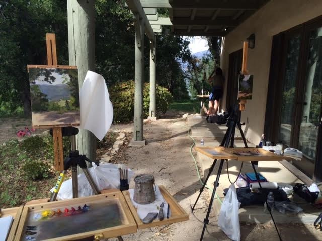 ARTISTS' PAINTS AND EASELS are at various spots on the property - including the patio of the Visitor Center/Caretaker Quarters. (Photo: Buzz Glasky, 2016)