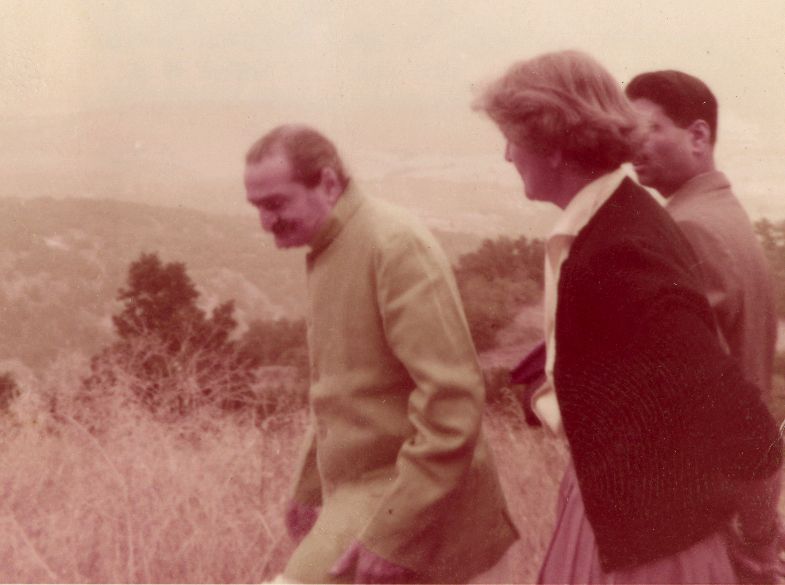 AVATAR MEHER BABA at Meher Mount on August 2, 1956, walking with co-founder and lifetime caretaker Agnes Baron and Meher Baba's close disciple Eruch Jessawala. (Photo: Adele Wolkin)