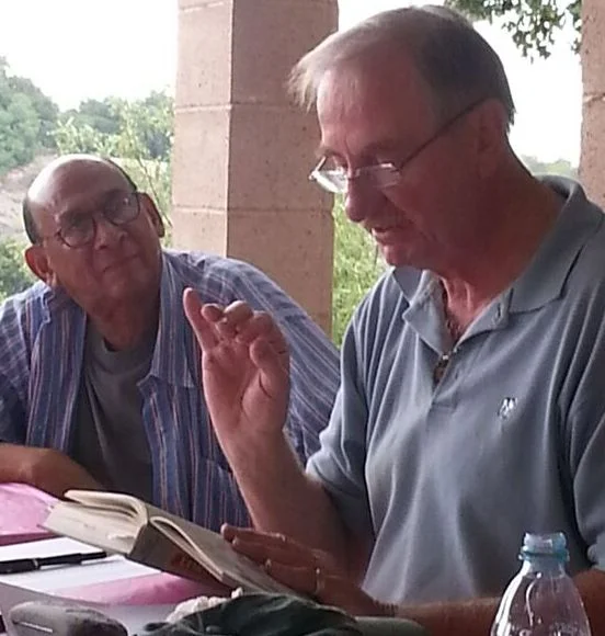 FRED STANKUS reads a passage from Lord Meher with Marc Brutus. (Photo: Margaret Magnus, 2015.)