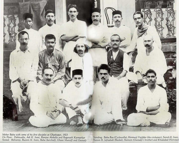 THE MANZIL-E-MEEM disciples with Avatar Meher Baba (center with a white headscarf) in 1923. (Source: Meher Baba Travels website.)
