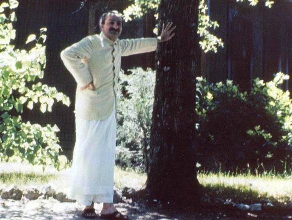 AVATAR MEHER BABA standing outside the "Guest House" at the Meher Spiritual Center in Myrtle Beach, SC, in 1952. (Photo: Glow International )