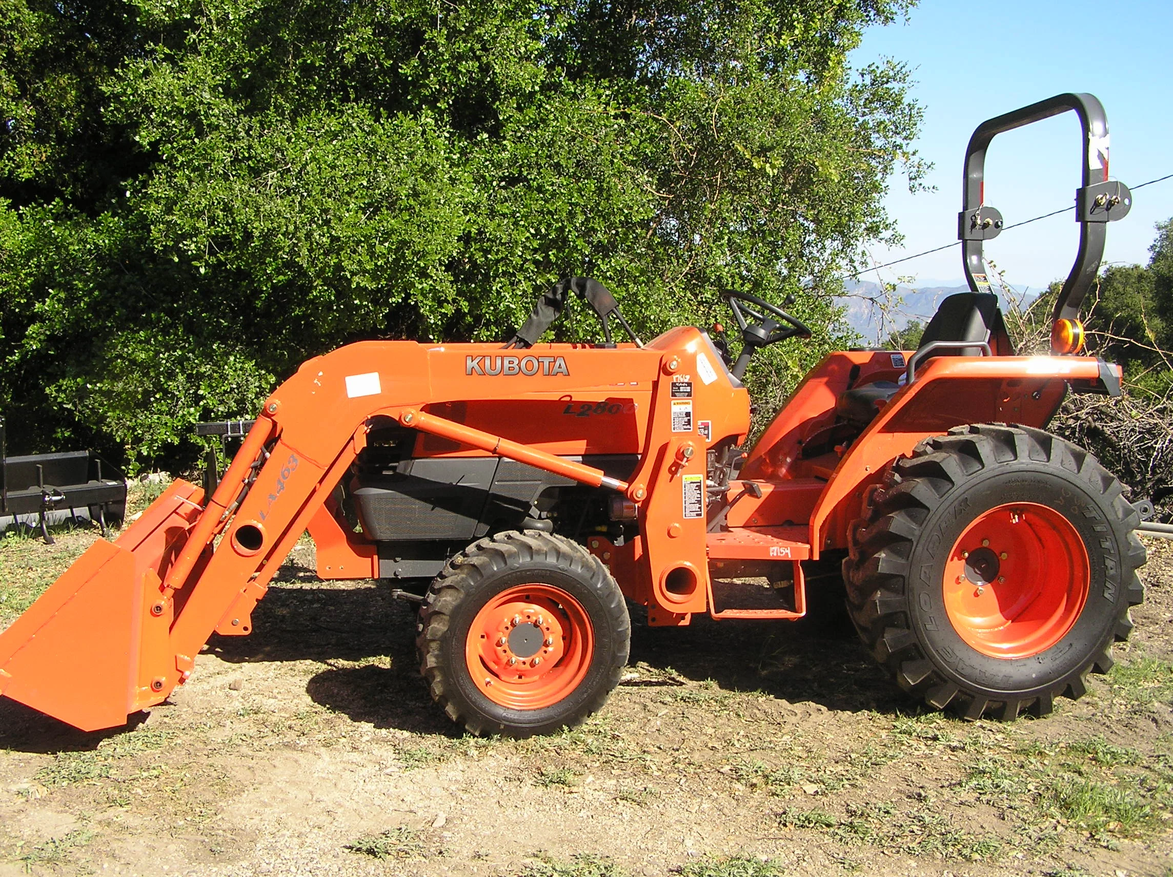 THE INDISPENSIBLE TRACTOR with four different detachable implements ushered in a new era of Manager/Caretaker capabilities and responsibilities. (Photo: Sam Ervin, 2013)
