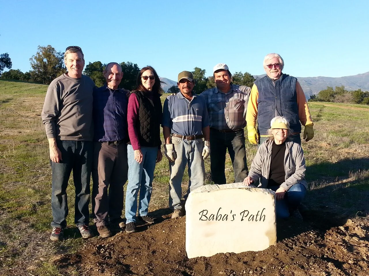 A HAPPY GROUP after 14 stone signs and markers have been installed. (Left to right): Rob Conover, Sam Ervin, Diane Conover, two helpers, Buzz Glasky, Ginger Glasky. (Photo: Margaret Magnus, 2017) 
