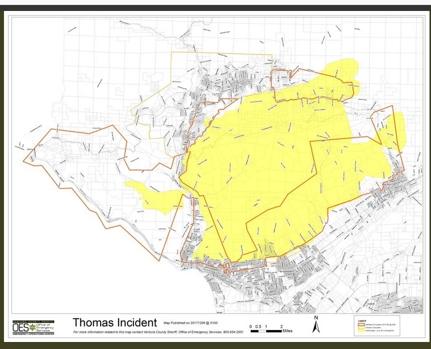 A VIEW OF THE LARGER THOMAS FIRE AREA also on Tuesday, December 5, 2017. Meher Mount is located near the top and to the right of the yellow-shaded area. The structures at the bottom of the map are in the cities of Ventura (left) and Santa Paula (right). The structures at the top of the map are in the cities of Ojai and Meiners Oaks.