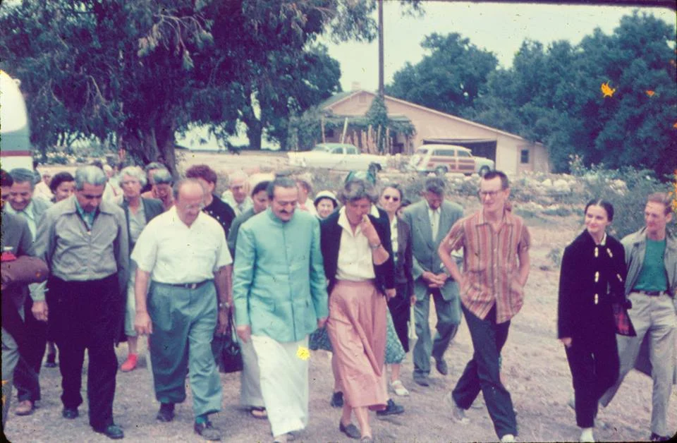 AVATAR MEHER BABA at Meher Mount on August 2, 1956. Walking next to Meher Baba is co-founder and lifetime caretaker of Meher Mount, Agnes Baron. (Photo: Meher Archive Collective )