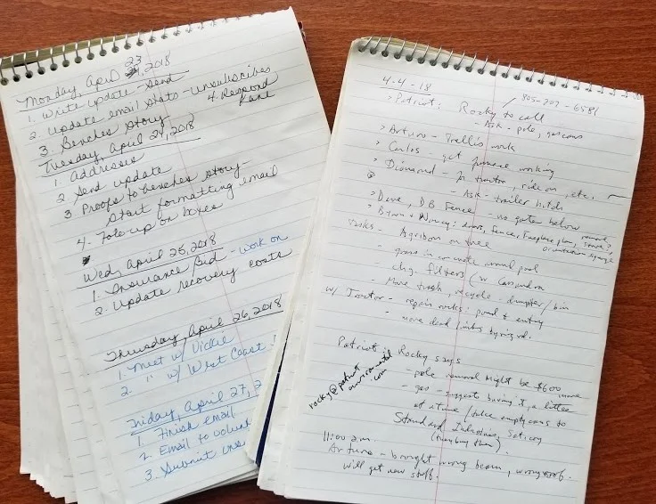 RANDOM PAGES from the activity logs of Margaret Magnus and Sam Ervin who started writing down daily accomplished tasks for fire recovery and regeneration at Meher Mount just to feel that progress was being made. (Photo: Margaret Magnus, 2018)