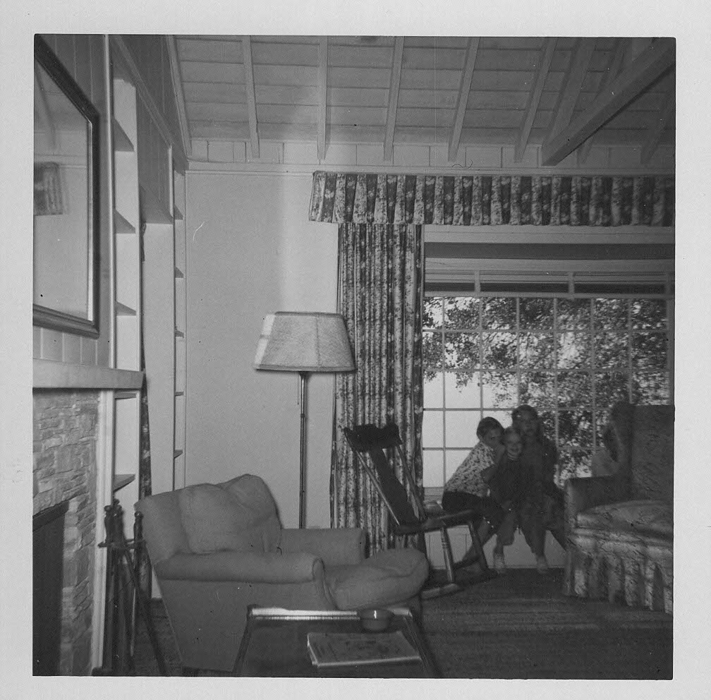 THE ‘BABAROOM’ in the guest house at Meher Mount. Joan Dimpfl Harland sent these photos taken by her father Lud Dimpfl in November 1956, just months after Meher Baba’s 1956 visit. The fireplace to the left of the photo, now known as Baba’s Fireplace, is the only remaining piece of this special room where Meher Baba gave darshan to His followers. All the buildings were destroyed in the October 1985 New Life Fire. The wing-back chair to the right in front of the window was where Meher Baba sat, and it, too, burned in the 1985 fire. The area that once contained this room is now called the Darshan Courtyard. The children are Joan Dimpfl Harland, Claudia Dimpfl O’Hanrahan, and Diane Dimpfl Cobb (also known as BBB or 3B as nicknamed by Meher Baba).