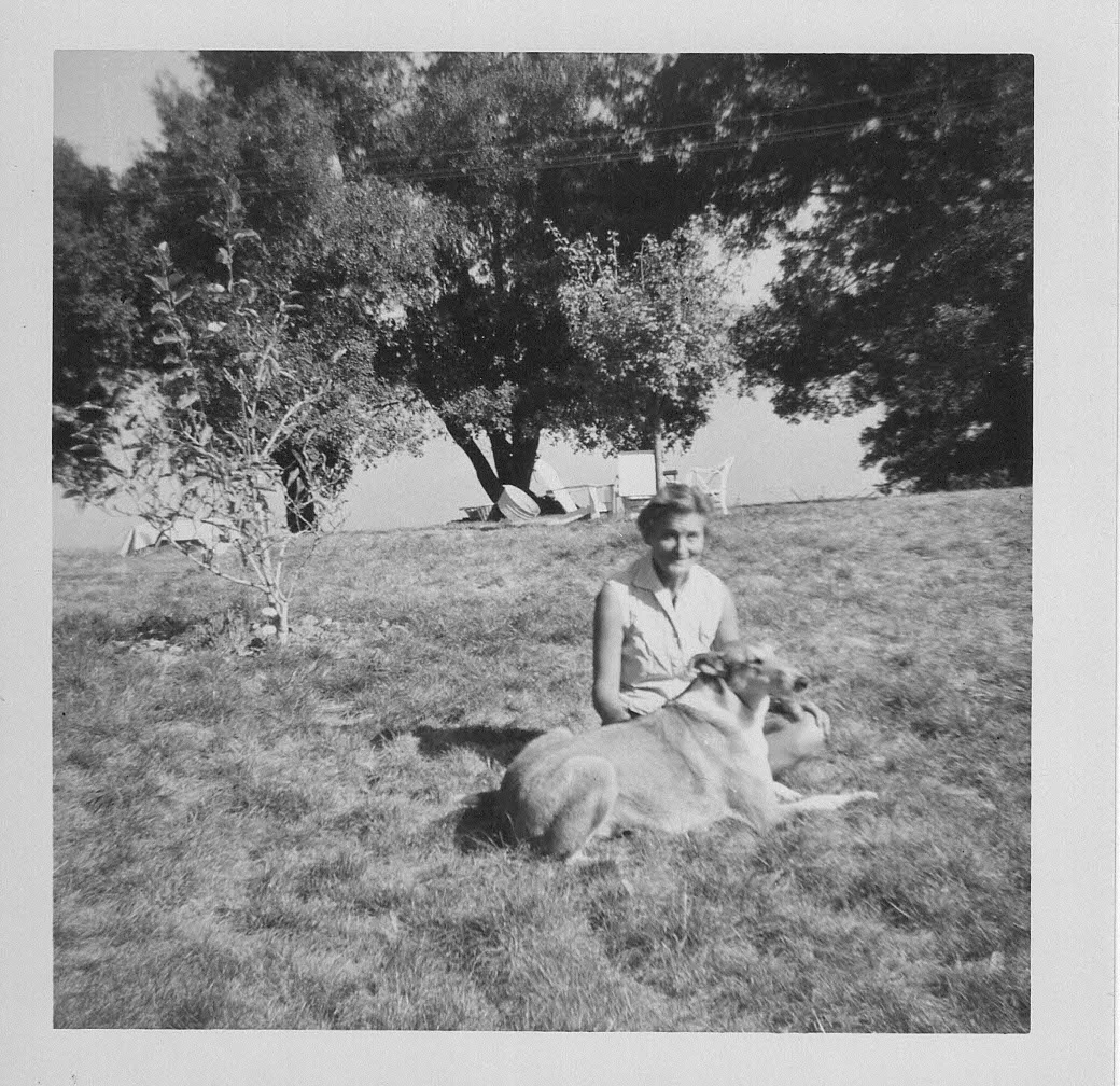 AGNES BARON with her dog, Kali, who was also at Meher Mount when Meher Baba visited in 1956. Agnes said that Meher Baba indicated Kali would be a human in his next lifetime. (Photo: Lud Dimpfl, November 1956)