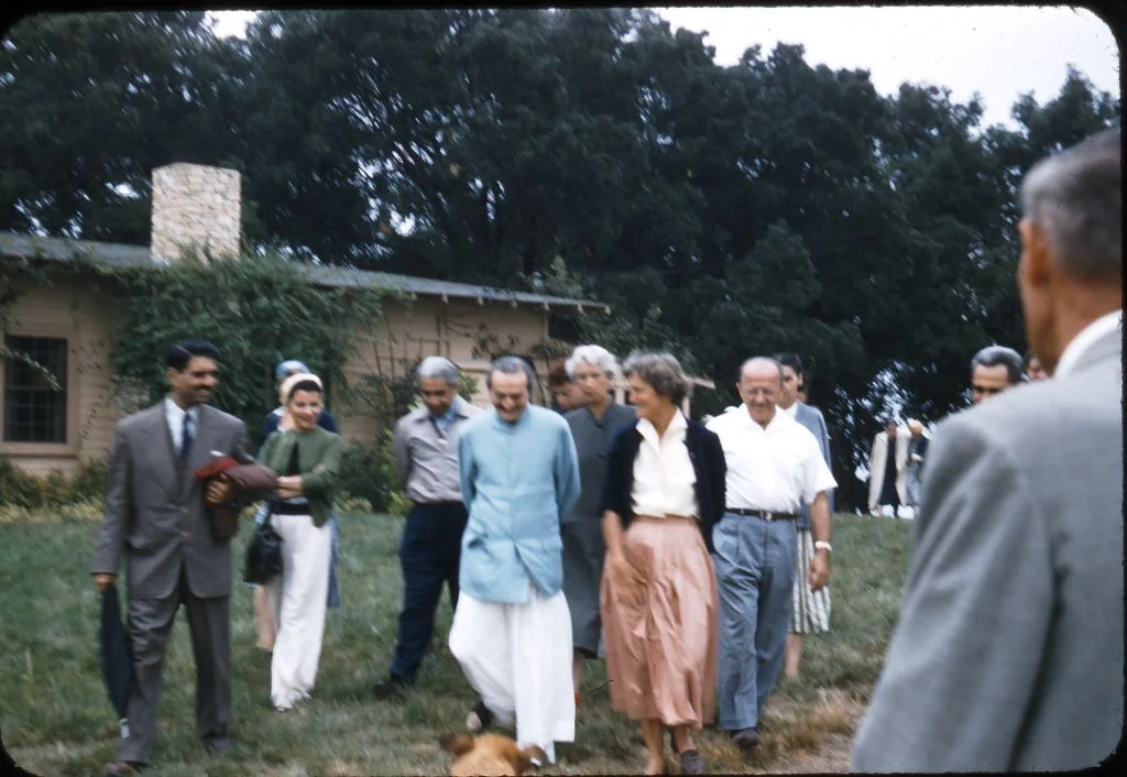 AT MEHER MOUNT on August 2, 1956. (Left to right): Eruch Jessawala, Bili Eaton, Adi K. Irani, Avatar Meher Baba, Enid Corfe, Agnes Baron, Fred Winterfeldt, Meherjee Karkaria, and Frank Hendrick. (Photo: Darwin Shaw, ©Meher Nazar Publications)