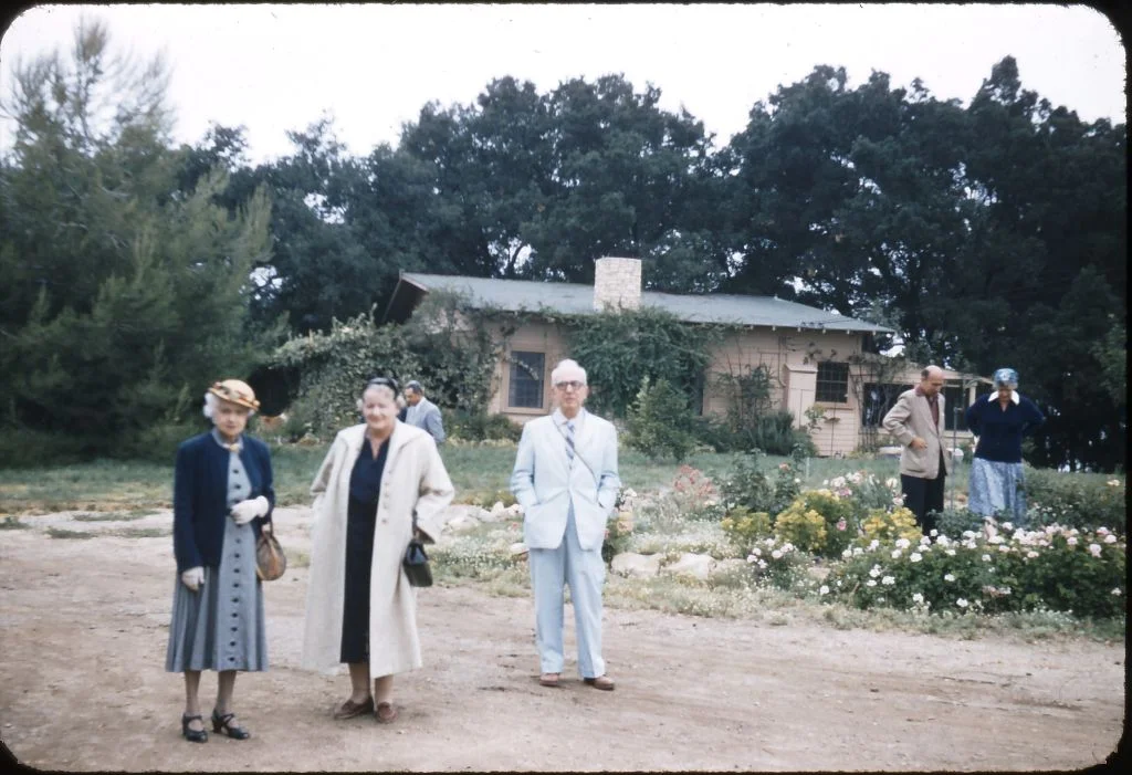 VISITORS to Meher Mount on August 2, 1956, with Avatar Meher Baba. (Left to right): Unidentified; Elizabeth Patterson, one of the founders of the Meher Spiritual Center in Myrtle Beach, SC; and Dana Field. (Photo: Darwin Shaw, ©Meher Nazar Publications) To identify any other figures in the photograph, contact Meher Mount.