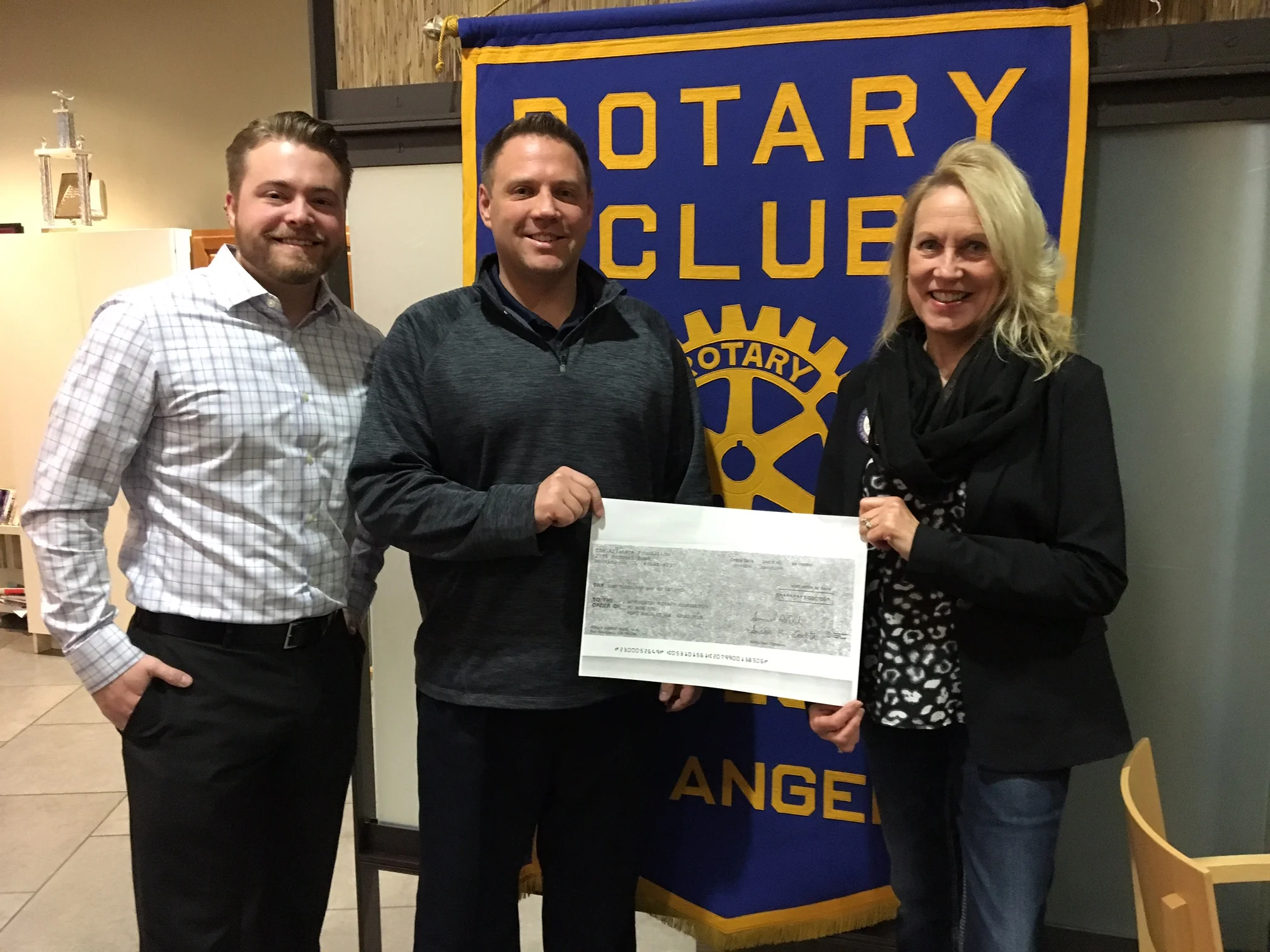 Left to Right: Andy Callis, President of Nor'Wester Rotary, Matt Elwood, owner of Allstate Insurance and Helen Arnold, Nor'Wester Rotarian.