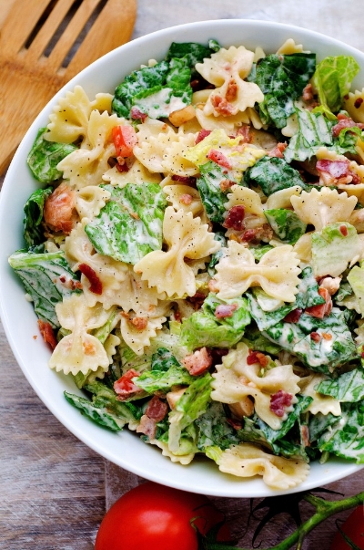 A BLT can be just as yummy without the bread and here is how! This colorful dish includes bacon, lettuce, tomato, pasta, and ranch dressing. Photography and recipe found at: life-in-the-lofthouse.com