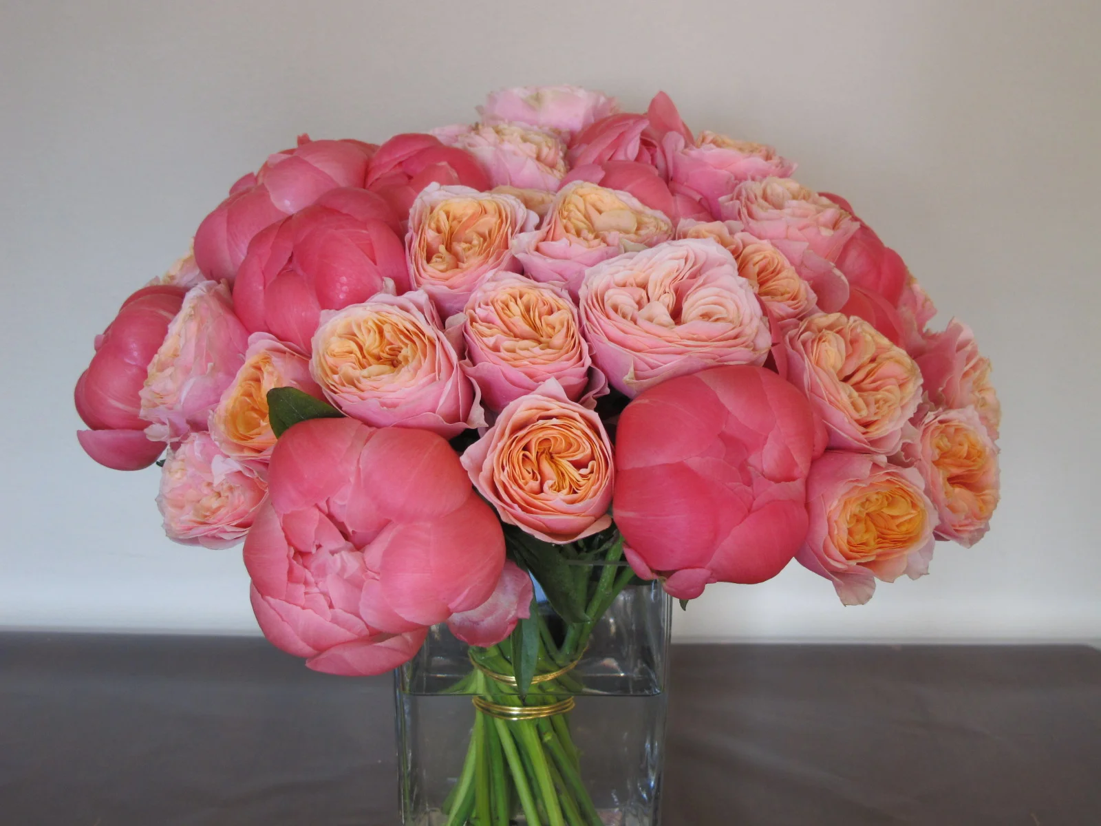 coral peonies and garden roses