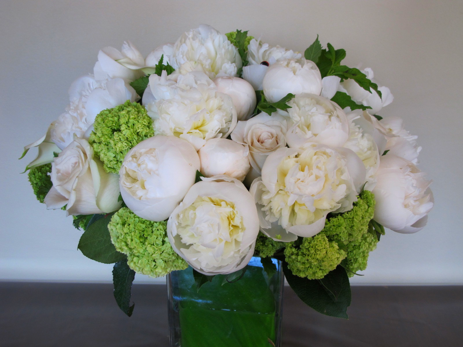 White Peonies, roses with accents of viburnum