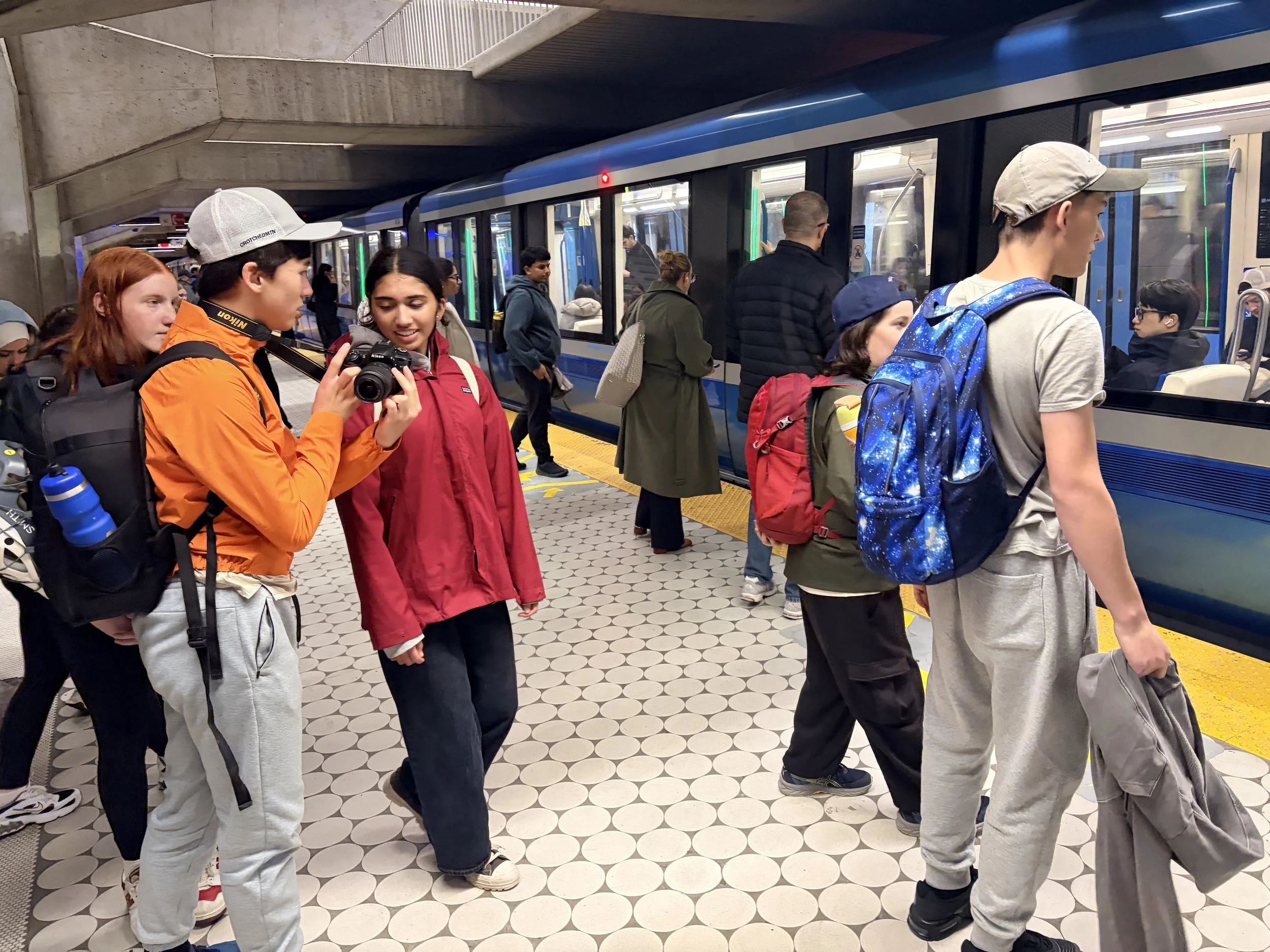 Students navigate the Montreal metro