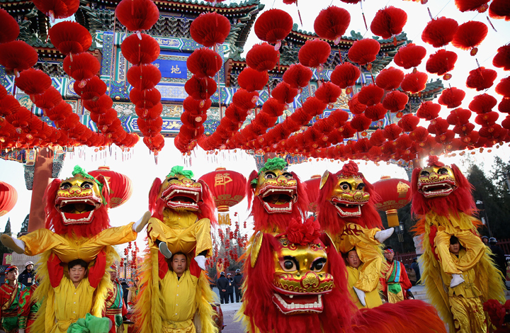 Chinese folk artists perform during the opening ceremony of the Spring Festival Temple Fair at the Temple of Earth park on Jan. 30, 2014 in Beijing, China. (Photo credit: Feng Li/Getty Images)
