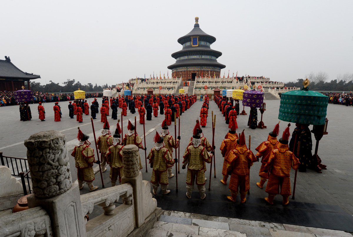 Chinese performers during a traditional Qing Dynasty ceremony in which emperors prayed for good fortune, during Lunar New Year festivities at the Temple of Heaven in Beijing on January 31, 2014. China welcomed in the Year of the Horse which sees about 3.62 billion trips made by Chinese travelers during the 40-day Spring Festival travel period. AFP PHOTO/Mark RALSTON (Photo credit should read MARK RALSTON/AFP/Getty Images)