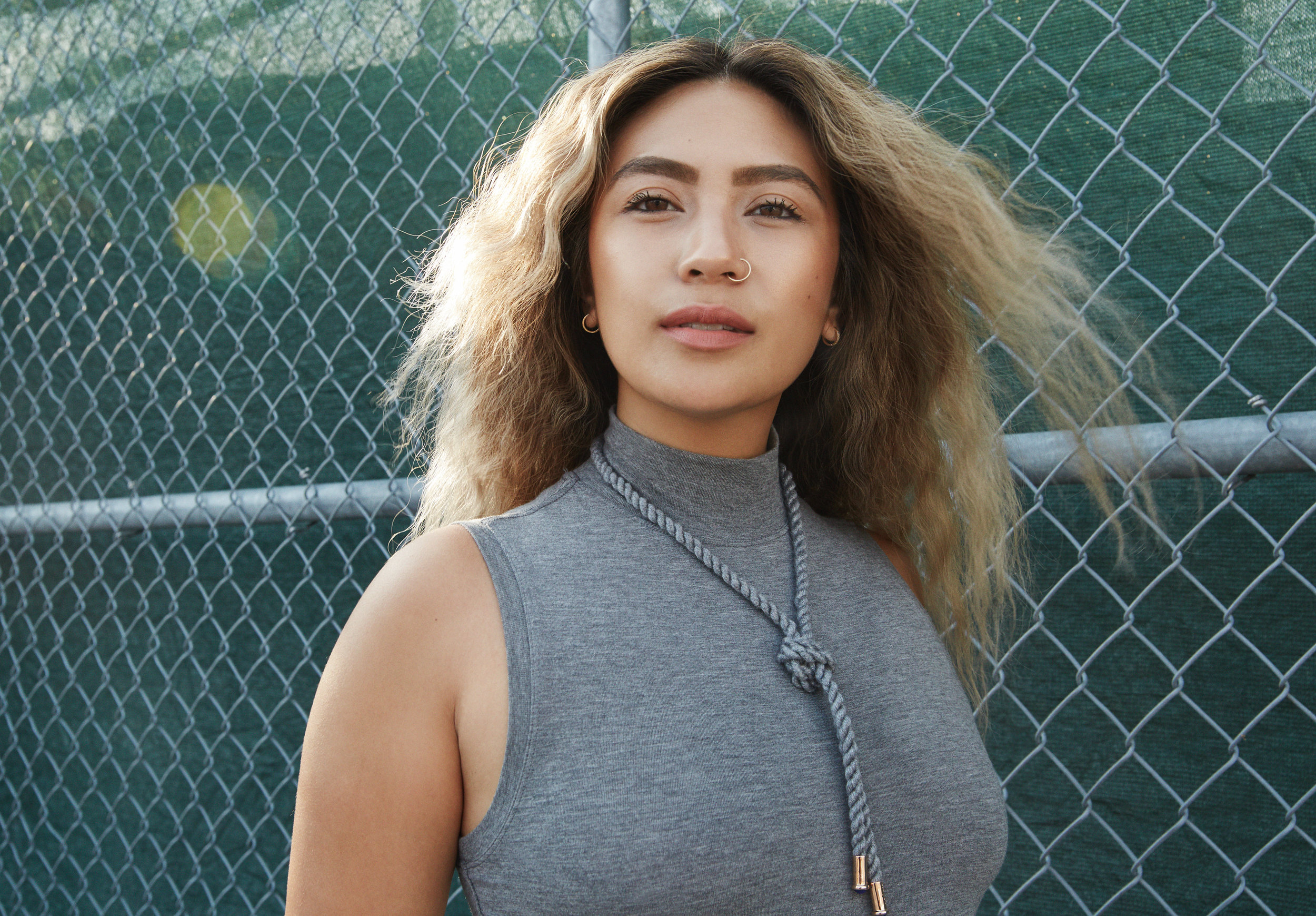 Cheng is wearing the Iconic Twisted Lapis Necklace