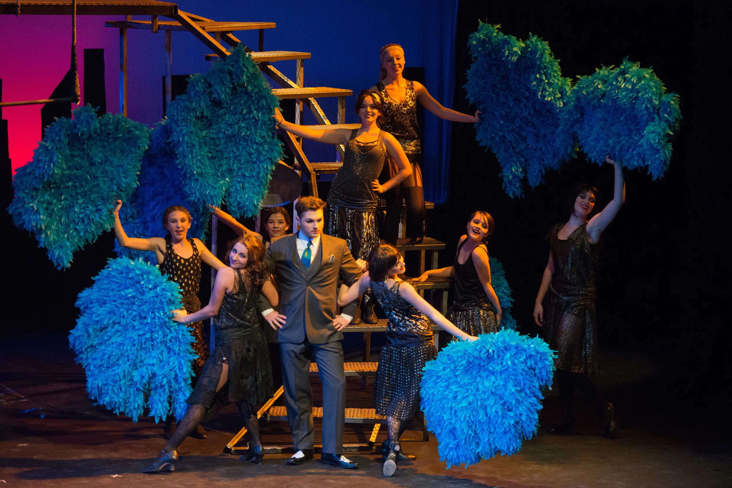 (bottom, left to right) Hailey Turner, Claudia Fanaro, Rio Salazar, Ciara Tolliver, Mae Pendergast, Camille Umoff (Above, top to bottom) Libby Sestak and Hailey Simmons express their love for Billy Flynn, portrayed by Grant Bower in Chicago at Santa Barbara High School, Fall 2013. Photo courtesy of Kristi Sestak.